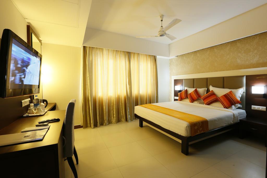Hotel Moonlit Regency Thodupuzha Rum bild