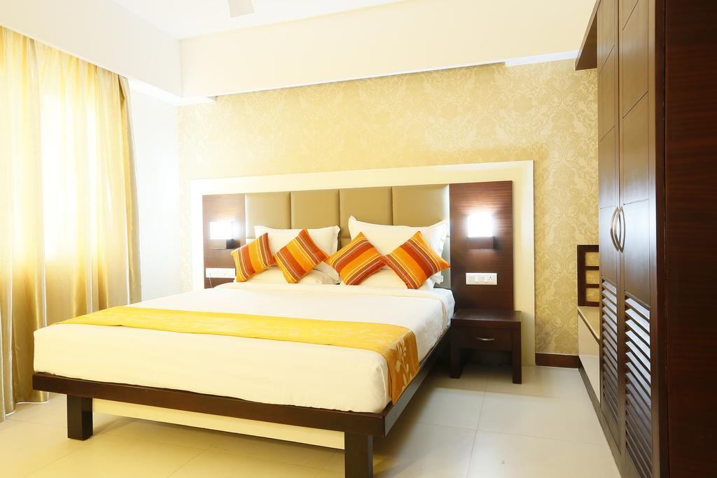 Hotel Moonlit Regency Thodupuzha Rum bild